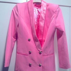 Pink oversize blazer or blazer dress with gold buttons.